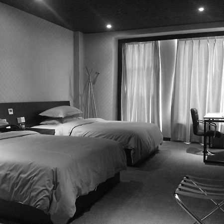 Shangshan Hotel Leshan Esterno foto